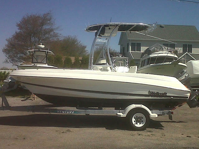 Wellcraft 180 Fisherman center console boat with universal ttop by Stryker T-Tops installed