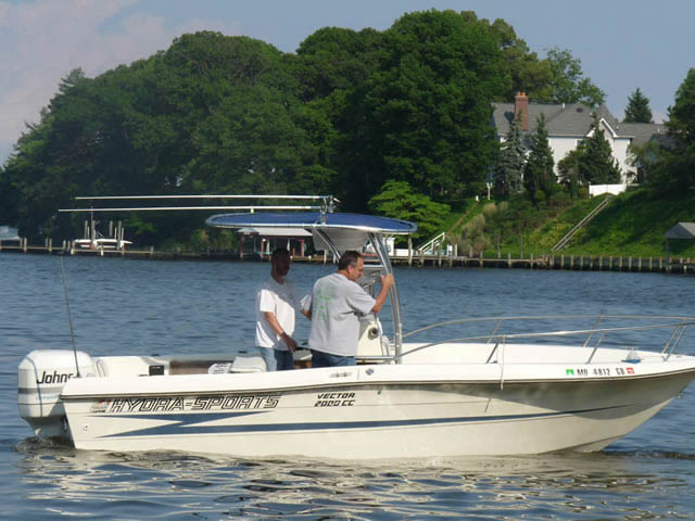 Hydrasports Vector 2000CC center console boat with universal ttop by Stryker T-Tops installed