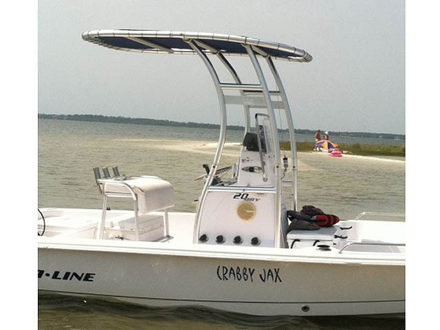 Pro-Line Bay 20 center console boat with universal ttop by Stryker T-Tops installed