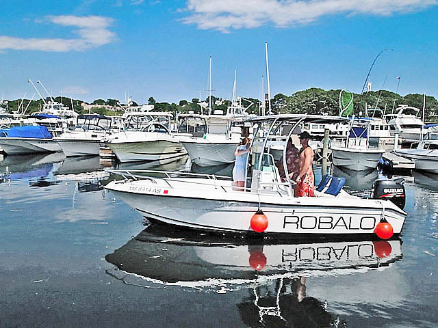 Robalo center console boat with universal ttop by Stryker T-Tops installed
