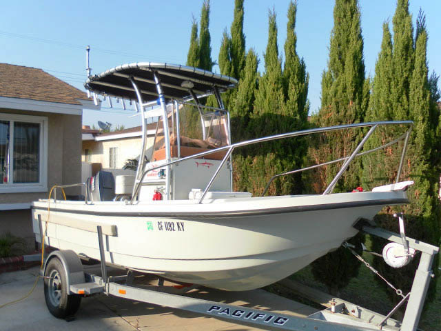 2000  Radon  cc1601 center console boat with universal ttop by Stryker T-Tops installed