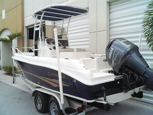 2003 Caravelle  center console boat with universal ttop by Stryker T-Tops installed