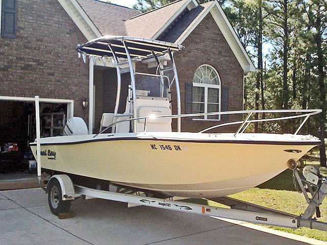 2006 Coral Bay center console boat with universal ttop by Stryker T-Tops installed
