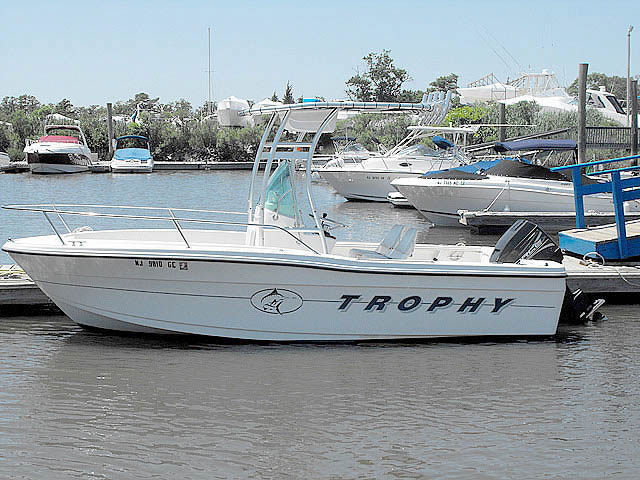 1998 Trophy 1903 center console boat with universal ttop by Stryker T-Tops installed