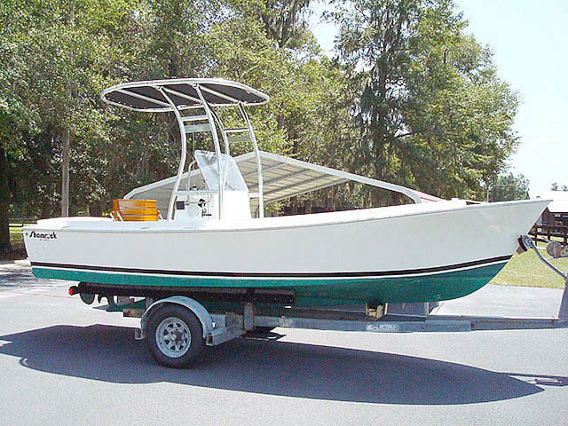 1974 Shamrock C/C center console boat with universal ttop by Stryker T-Tops installed