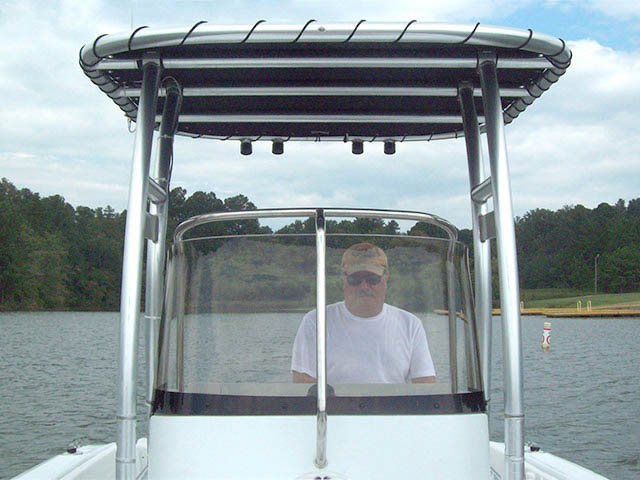 2006 Triumph 195CC center console boat with universal ttop by Stryker T-Tops installed