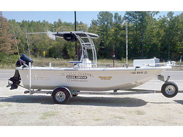 2008 Carolina Skiff 218 dlv center console boat with universal ttop by Stryker T-Tops installed