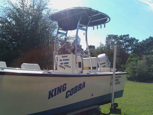 1984 Proline 24' Open Fisherman center console boat with universal ttop by Stryker T-Tops installed