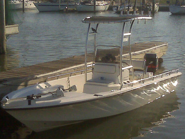 2004 Kenner CC 2102 Vision Tunnel center console boat with universal ttop by Stryker T-Tops installed