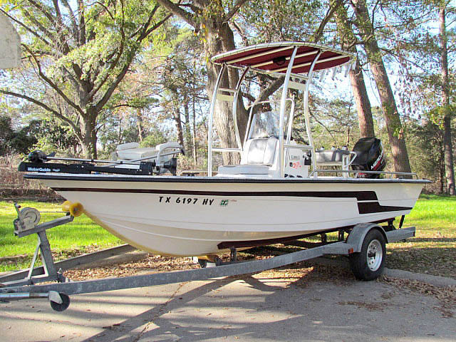 2000 Skeeter Bay Pro center console boat with universal ttop by Stryker T-Tops installed