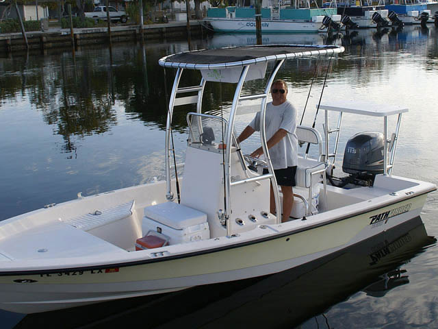 2002 Pathfinder 1900V center console boat with universal ttop by Stryker T-Tops installed