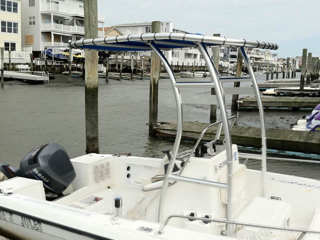 1993 Sunbird center console boat with universal ttop by Stryker T-Tops installed