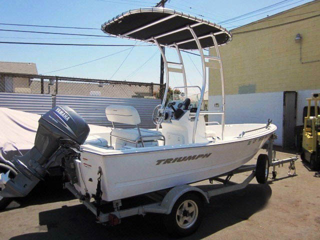 2008 Triumph 150cc center console boat with universal ttop by Stryker T-Tops installed