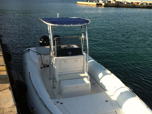 Stingher RIB center console boat with universal ttop by Stryker T-Tops installed