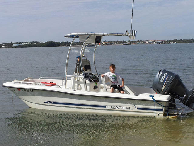 Leader center console boat with universal ttop by Stryker T-Tops installed