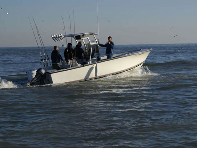 1989 Seacraft 23'3 center console boat with universal ttop by Stryker T-Tops installed