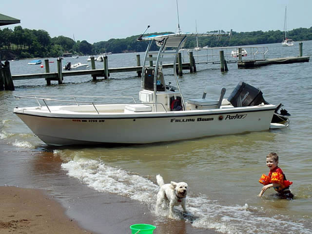 1988 Parker center console boat with universal ttop by Stryker T-Tops installed