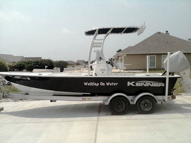 Kenner center console boat with universal ttop by Stryker T-Tops installed