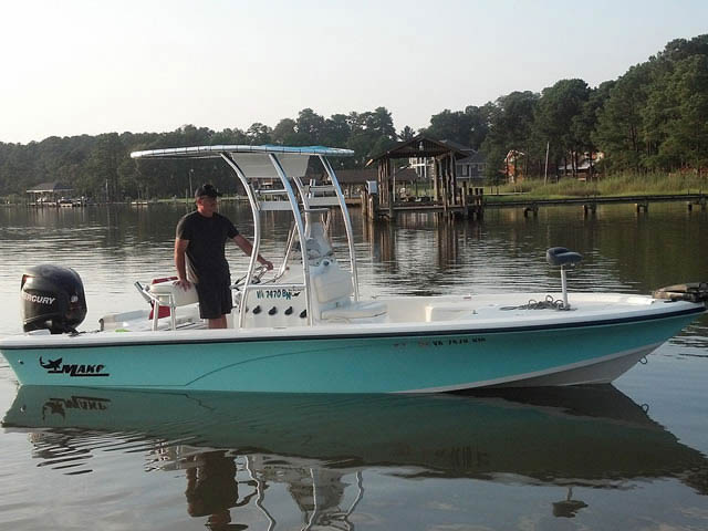 2009 Mako 2201 CC center console boat with universal ttop by Stryker T-Tops installed