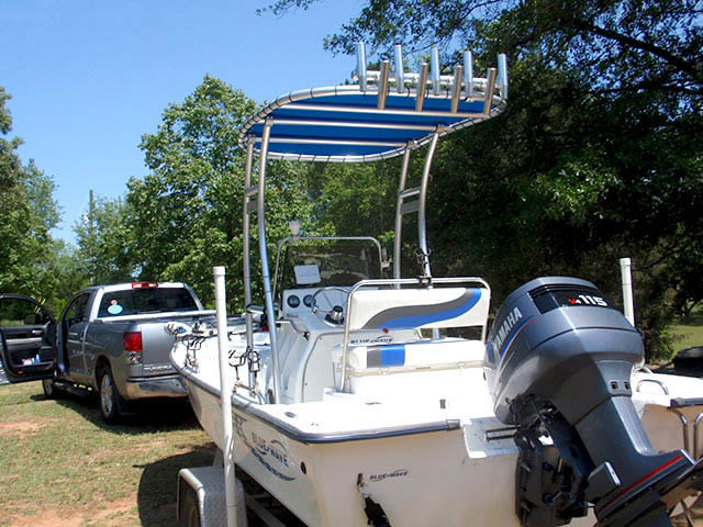 Blue Wave center console boat with universal ttop by Stryker T-Tops installed